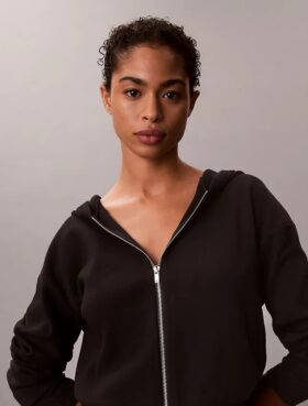 Hoodie i avslappnad stickning