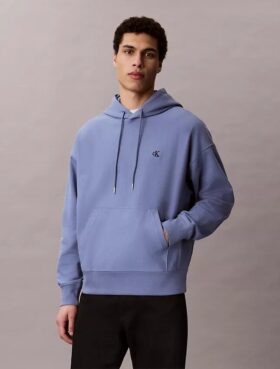 Hoodie i premiumfrotté med avslappnad passform och Monogram
