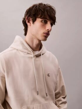 Hoodie i premiumfrotté med avslappnad passform och Monogram