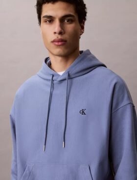 Hoodie i premiumfrotté med avslappnad passform och Monogram