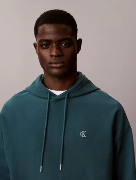 Hoodie i premiumfrotté med avslappnad passform och Monogram