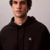 Hoodie i premiumfrotté med avslappnad passform och Monogram Hoodie i premiumfrotté med avslappnad passform och Monogram
