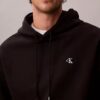 Hoodie i premiumfrotté med avslappnad passform och Monogram Hoodie i premiumfrotté med avslappnad passform och Monogram