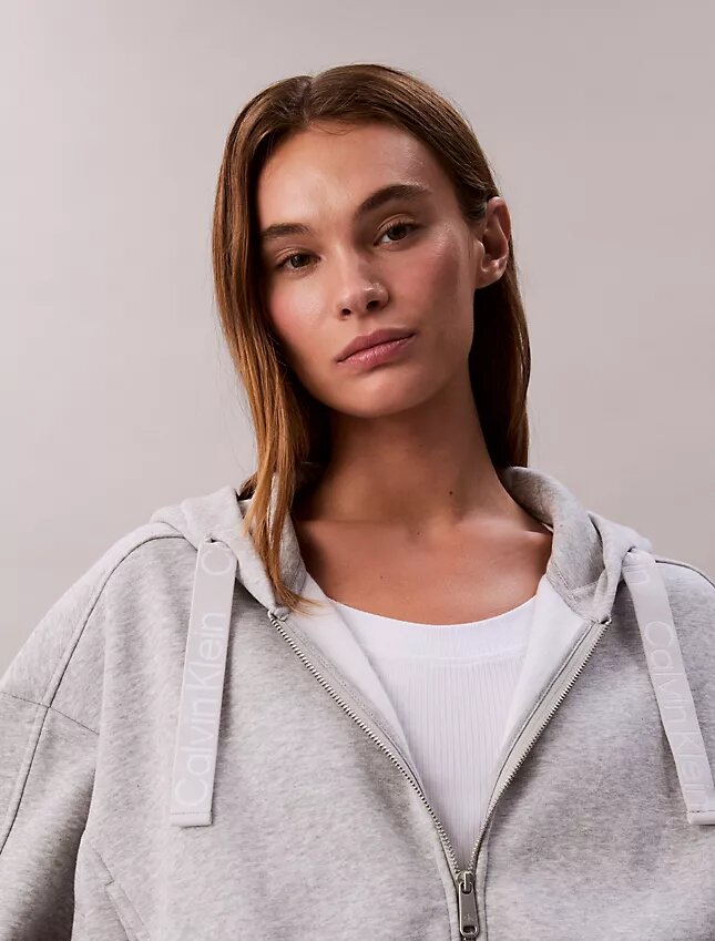 Huvtröja i fleece med logoband och dragkedja Huvtröja i fleece med logoband och dragkedja