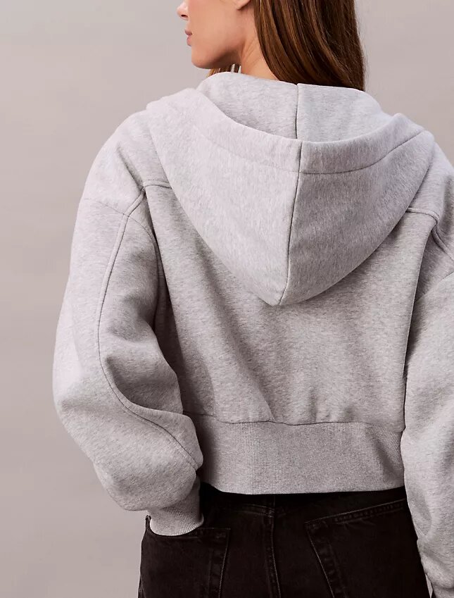 Huvtröja i fleece med logoband och dragkedja Huvtröja i fleece med logoband och dragkedja