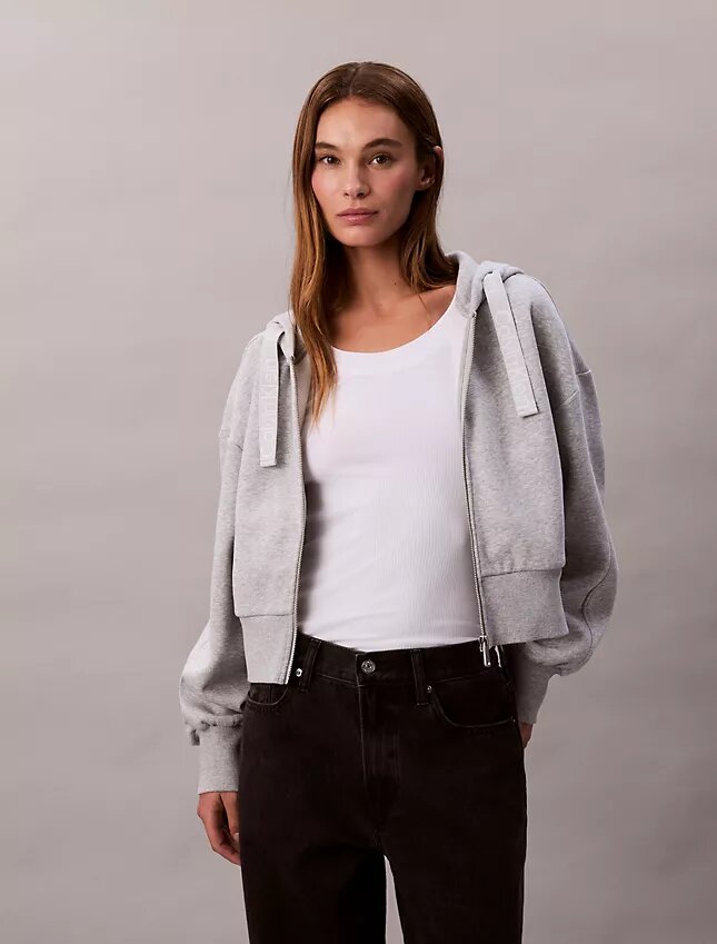Huvtröja i fleece med logoband och dragkedja Huvtröja i fleece med logoband och dragkedja