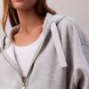 Huvtröja i fleece med logoband och dragkedja Huvtröja i fleece med logoband och dragkedja