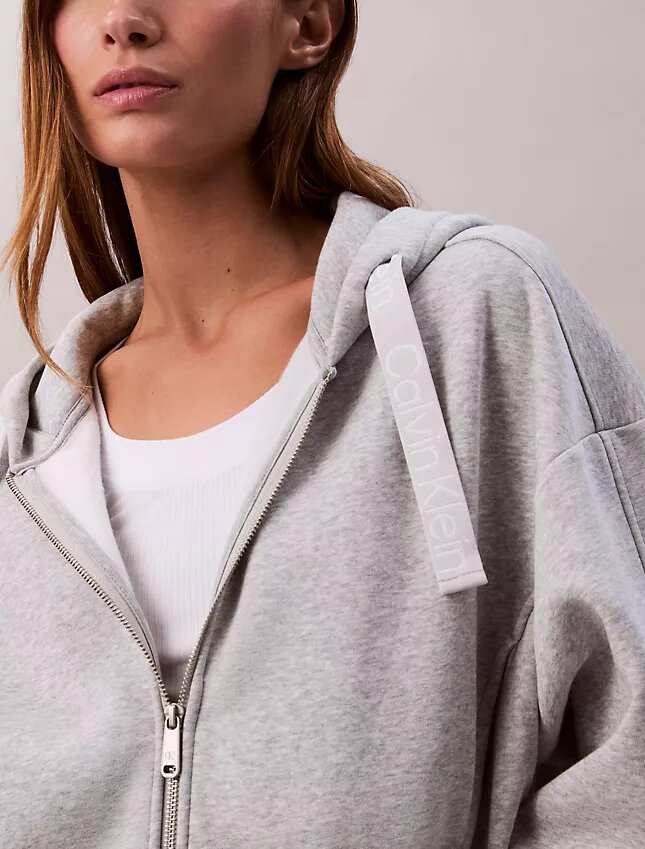 Huvtröja i fleece med logoband och dragkedja Huvtröja i fleece med logoband och dragkedja