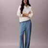 Jeans i avslappnad denim med dragkedja Jeans i avslappnad denim med dragkedja