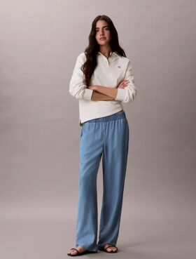 Jeans i avslappnad denim med dragkedja