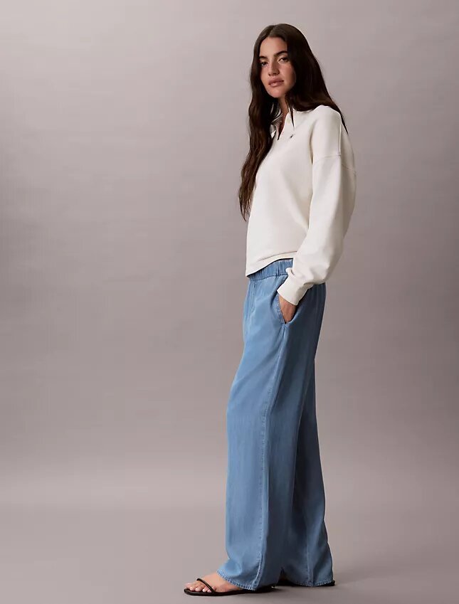 Jeans i avslappnad denim med dragkedja Jeans i avslappnad denim med dragkedja