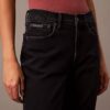 Jeans med medelhög midja och utsvängda ben Jeans med medelhög midja och utsvängda ben