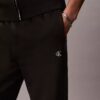 Joggingbyxor i fleece med Monogram Joggingbyxor i fleece med Monogram