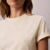Klassisk T-shirt med blekt Monogram över hela plagget Klassisk T-shirt med blekt Monogram över hela plagget