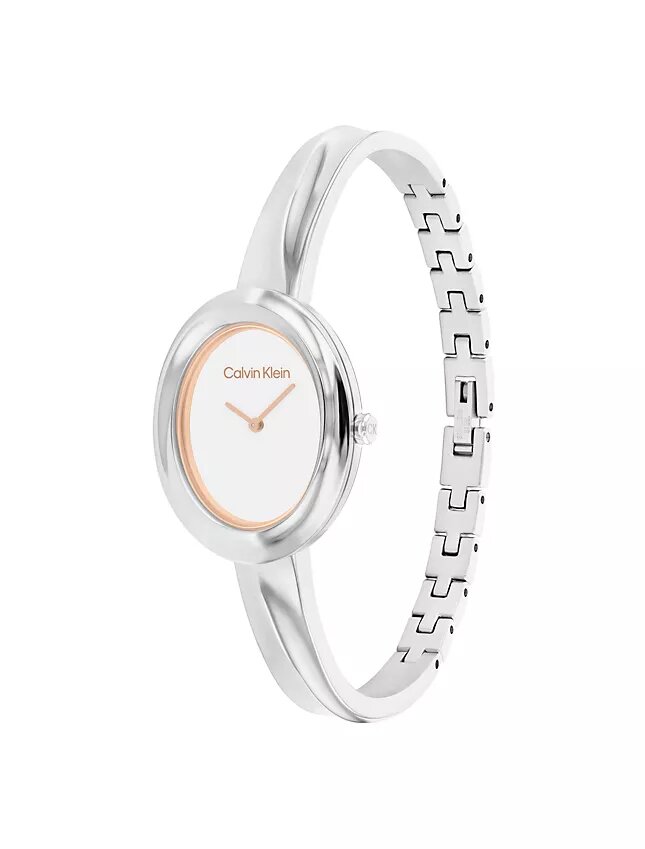 Klocka med konturerad bezel Klocka med konturerad bezel
