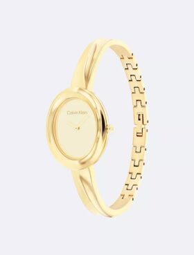 Klocka med konturerad bezel Klocka med konturerad bezel