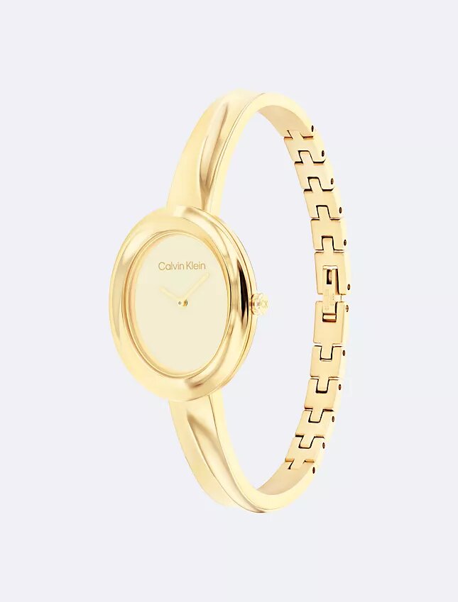 Klocka med konturerad bezel Klocka med konturerad bezel