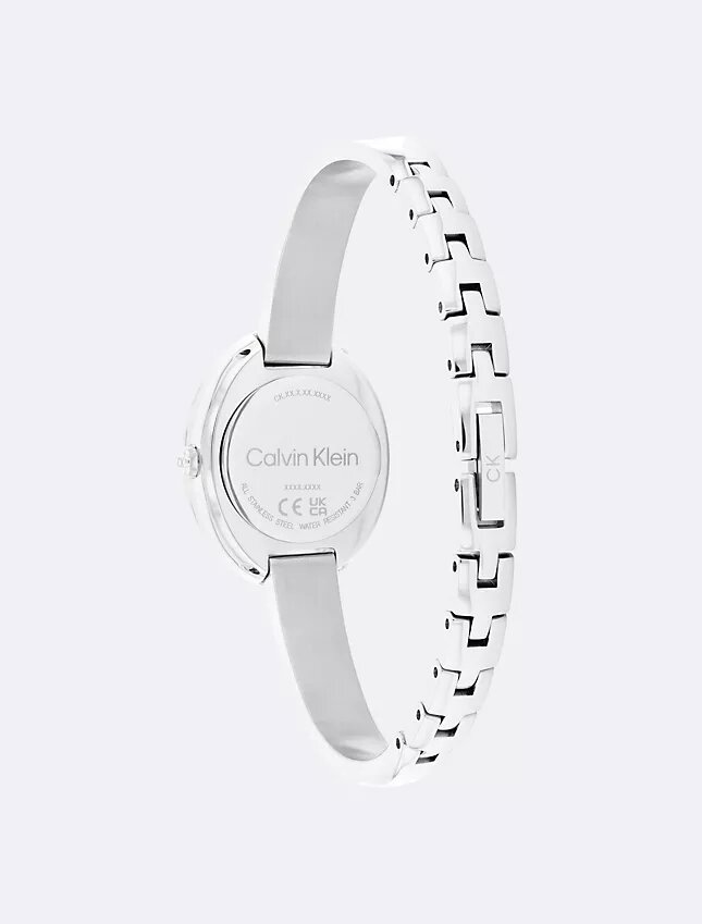 Klocka med konturerad bezel Klocka med konturerad bezel
