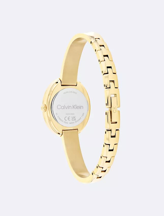 Klocka med konturerad bezel Klocka med konturerad bezel