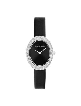 Klocka med konturerad bezel, oval urtavla och läderarmband Klocka med konturerad bezel, oval urtavla och läderarmband