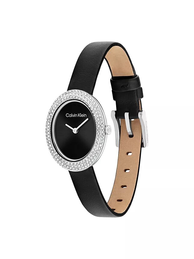 Klocka med konturerad bezel, oval urtavla och läderarmband Klocka med konturerad bezel, oval urtavla och läderarmband