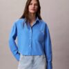 Kort, boxig skjorta i bomullspoplin med knappar Kort, boxig skjorta i bomullspoplin med knappar