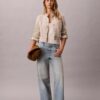 Lågmidjade baggy-Jeans med logotyp Lågmidjade baggy-Jeans med logotyp