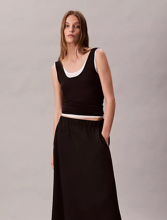 Midi-kjol i nylon med dragkedja Midi-kjol i nylon med dragkedja