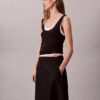 Midi-kjol i nylon med dragkedja Midi-kjol i nylon med dragkedja