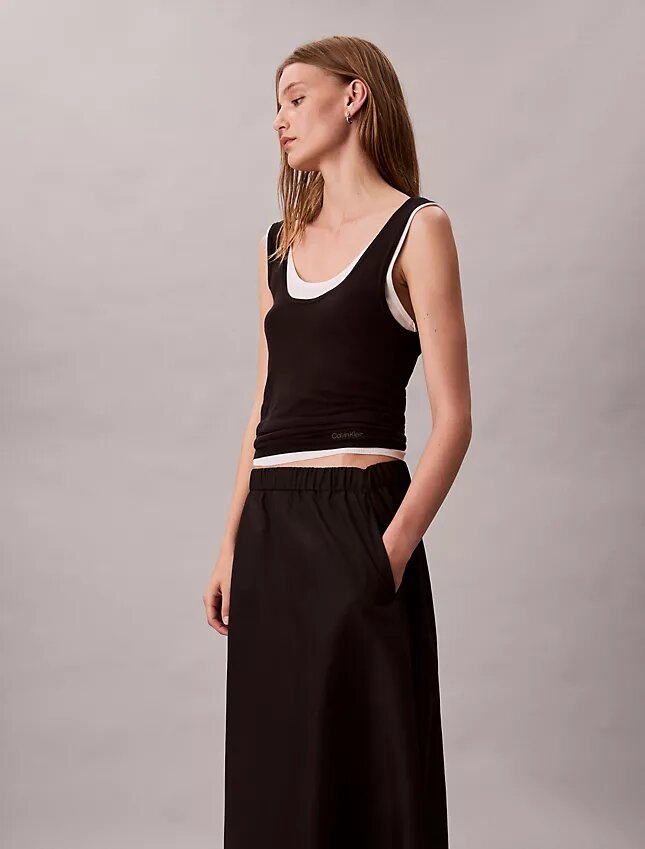 Midi-kjol i nylon med dragkedja Midi-kjol i nylon med dragkedja