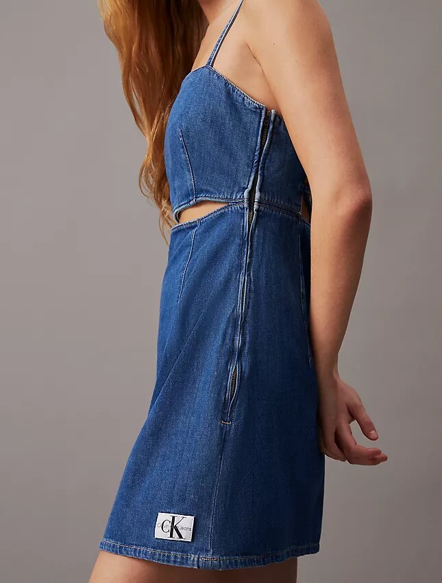 Miniklänning i denim med utskärningar Miniklänning i denim med utskärningar