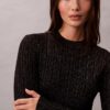 Miniklänning i lurex- och merinoullsblandning Miniklänning i lurex- och merinoullsblandning