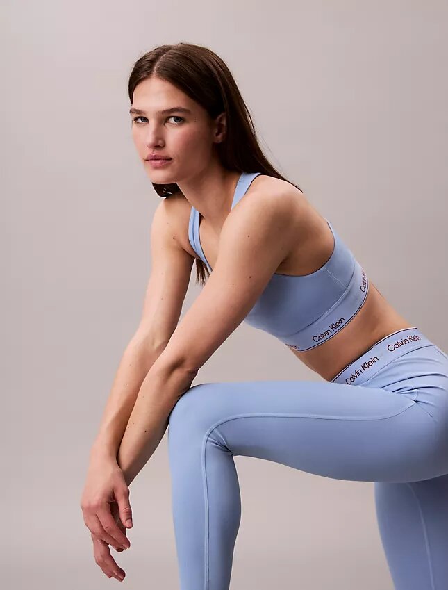 Moderna sportleggings med hög midja och logotyp i linningen, 7/8-längd Moderna sportleggings med hög midja och logotyp i linningen, 7/8-längd