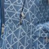 Ryggsäck i denim med emblem över hela ytan Ryggsäck i denim med emblem över hela ytan