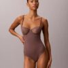 Sensuell bodysuit i stretchspets Sensuell bodysuit i stretchspets