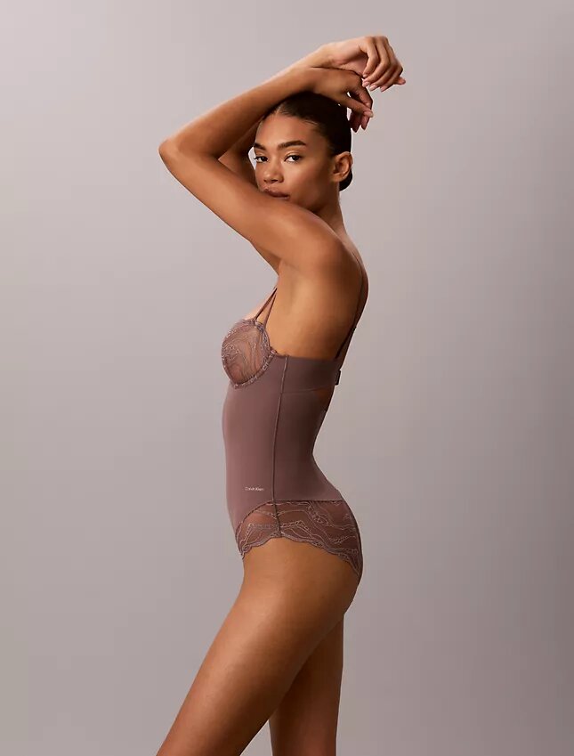 Sensuell bodysuit i stretchspets Sensuell bodysuit i stretchspets