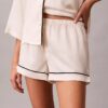 Shorts med satängglans Shorts med satängglans