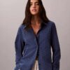 Skjorta med knappar och broderie anglaise Skjorta med knappar och broderie anglaise