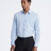 Slim fit-klänning i bomull med fiskbensmönster Slim fit-klänning i bomull med fiskbensmönster