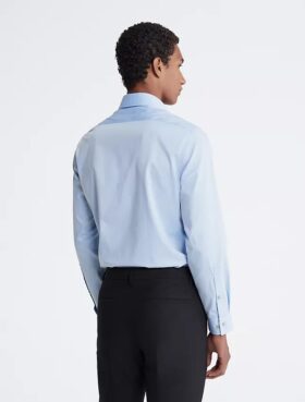Slim fit-klänning i bomull med fiskbensmönster Slim fit-klänning i bomull med fiskbensmönster