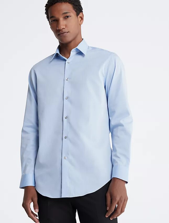 Slim fit-klänning i bomull med fiskbensmönster Slim fit-klänning i bomull med fiskbensmönster
