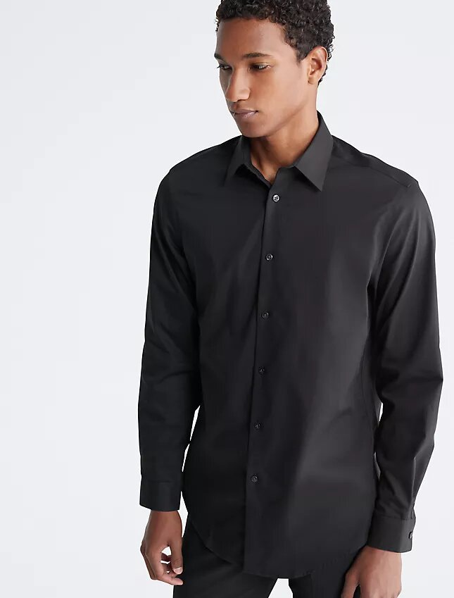Slim fit-klänning i bomull med fiskbensmönster Slim fit-klänning i bomull med fiskbensmönster