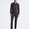 Slim fit-klänning i bomull med fiskbensmönster Slim fit-klänning i bomull med fiskbensmönster