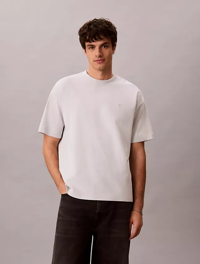 Sliten Monologo-grafik, avslappnad T-shirt Sliten Monologo-grafik, avslappnad T-shirt