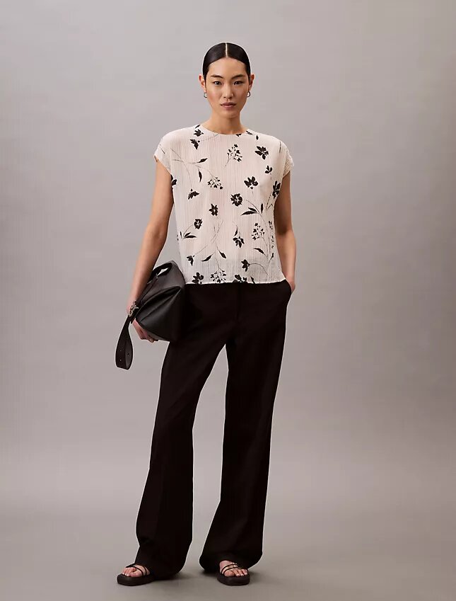 Smockad topp med blommönster Smockad topp med blommönster