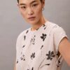 Smockad topp med blommönster Smockad topp med blommönster