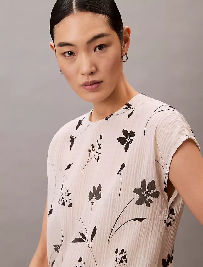 Smockad topp med blommönster Smockad topp med blommönster