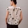 Smockad topp med blommönster Smockad topp med blommönster