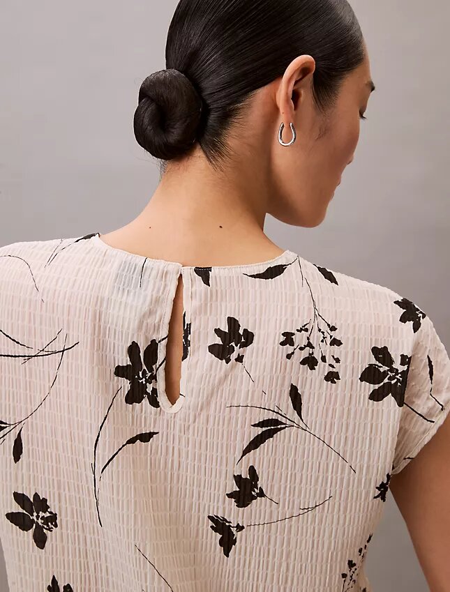 Smockad topp med blommönster Smockad topp med blommönster
