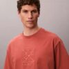 T-shirt med emblem och grafisk logotyp T-shirt med emblem och grafisk logotyp